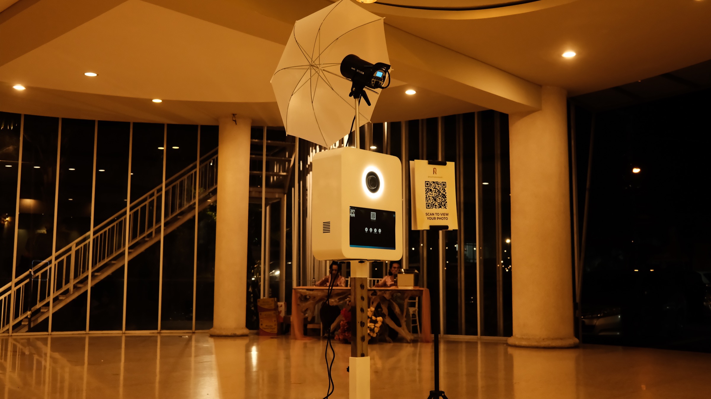 Nauhin photobooth setup with professional lighting and instant QR download
